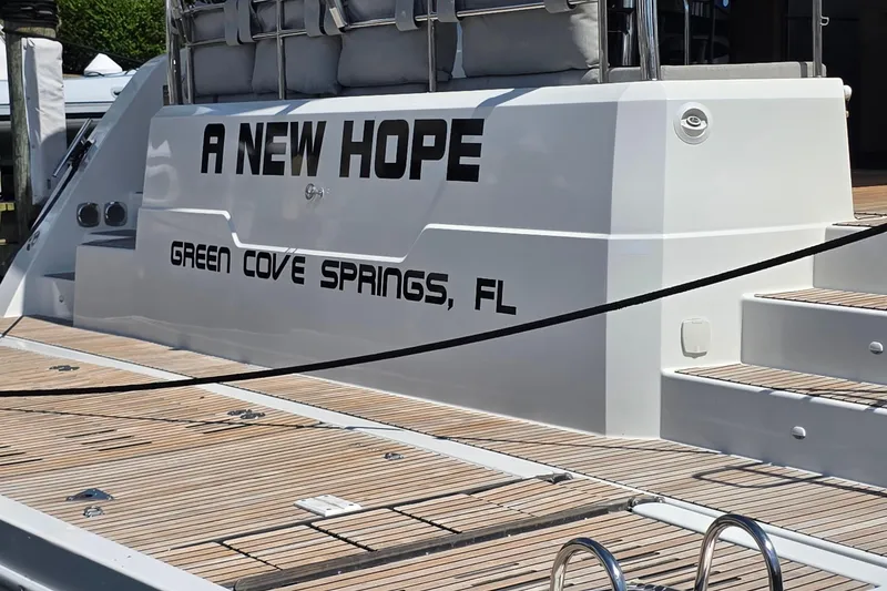 Slide: The Image of Fountaine Pajot Motor Yacht 44, 2018, docked with "A New Hope" name, Green Cove Springs, FL. - 8