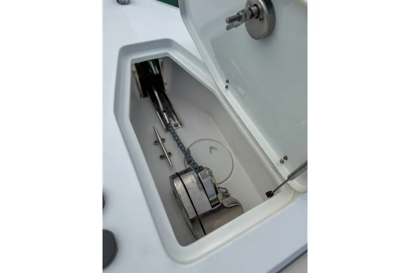 Slide: The Image of Anchor storage compartment on 2024 Sea Hunt Gamefish 27 Forward Seating boat. - 23