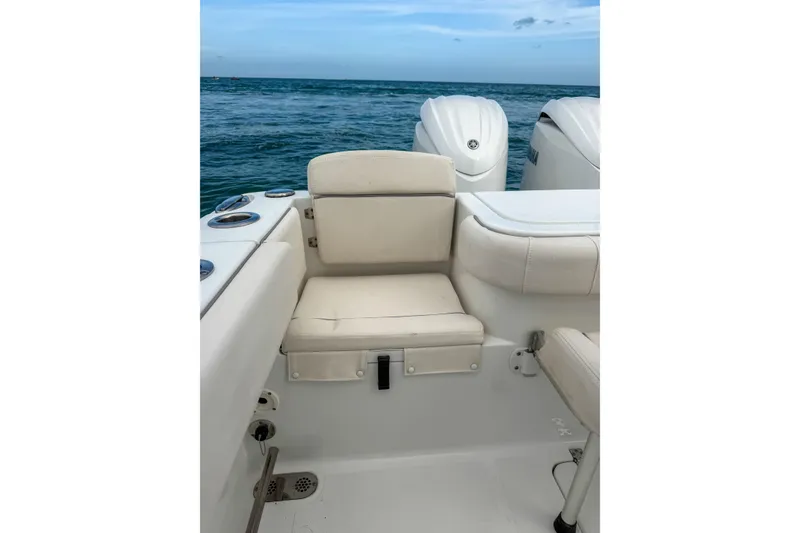 Slide: The Image of 2024 Sea Hunt Gamefish 27 boat with forward seating, ocean backdrop. - 31