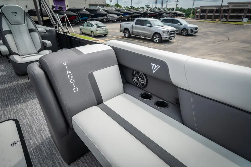 Slide: The Image of Luxurious interior of 2026 Viaggio Lago X-U 24 boat with sleek seating and cup holders. - 15