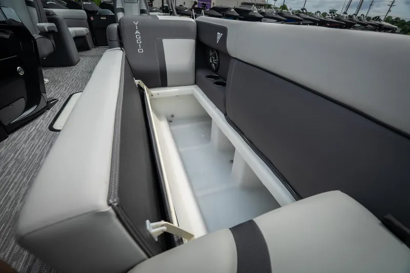 Slide: The Image of Viaggio Lago X-U 24 boat interior with open storage compartment, 2026 model. - 16