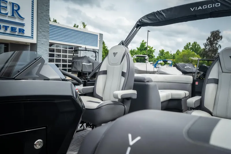 Slide: The Image of 2026 Viaggio Lago X-U 24 boat interior with modern seating and sleek design. - 19