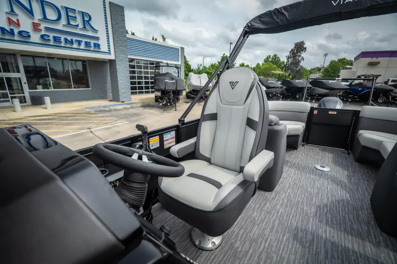 Slide: The Image of 2026 Viaggio Lago X-U 24 boat interior at a marine dealership. - 21