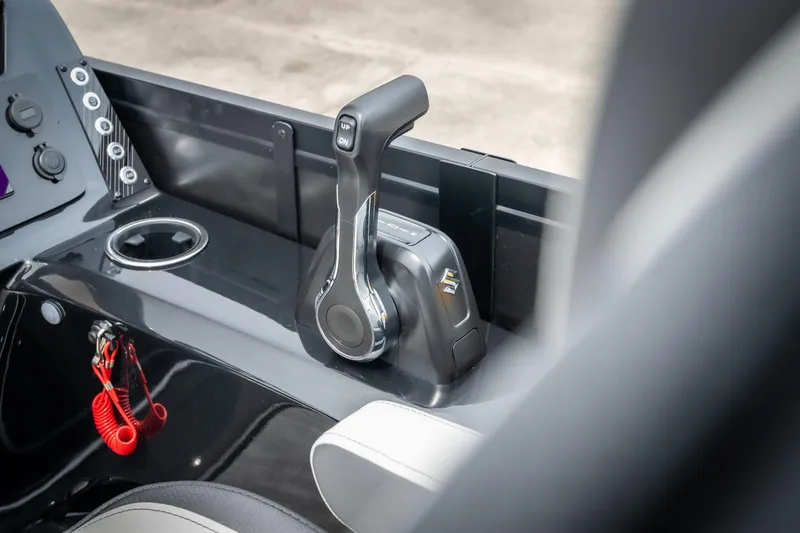 Slide: The Image of Control panel of 2026 Viaggio Lago X-U 24 boat, featuring sleek throttle design. - 24