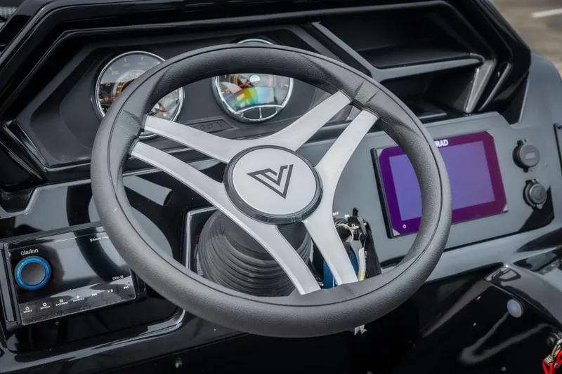 Slide: The Image of Steering wheel and dashboard of 2026 Viaggio Lago X-U 24 boat. - 27