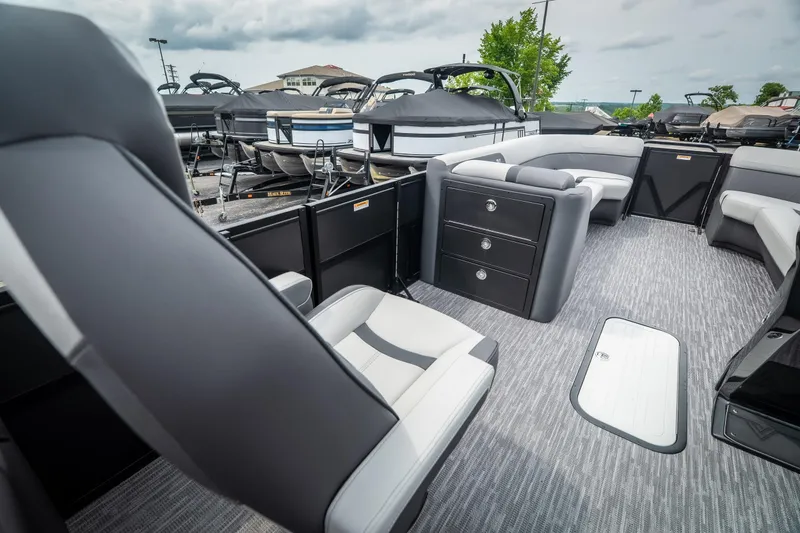 Slide: The Image of 2026 Viaggio Lago X-U 24 pontoon boat interior with modern seating and storage. - 29