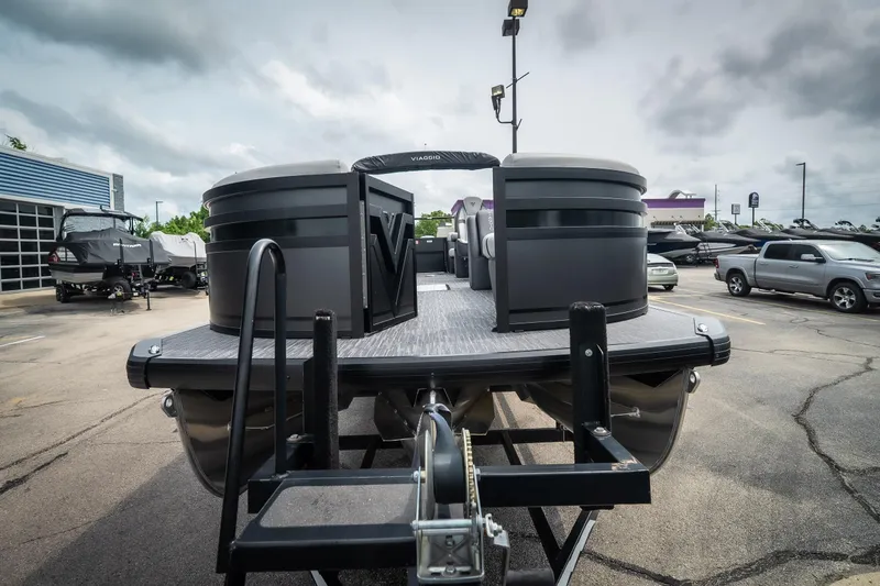 Slide: The Image of 2026 Viaggio Lago X-U 24 pontoon boat on trailer in dealership lot. - 3