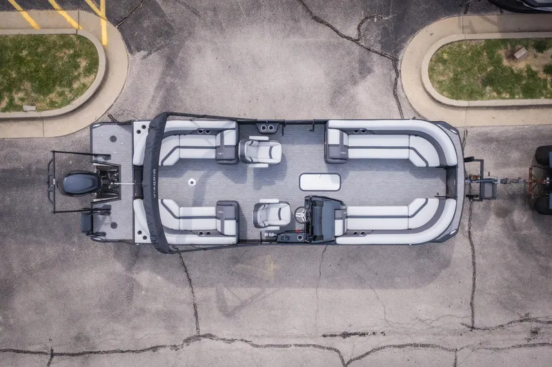 Slide: The Image of Overhead view of 2026 Viaggio Lago X-U 24 pontoon boat in parking lot. - 38