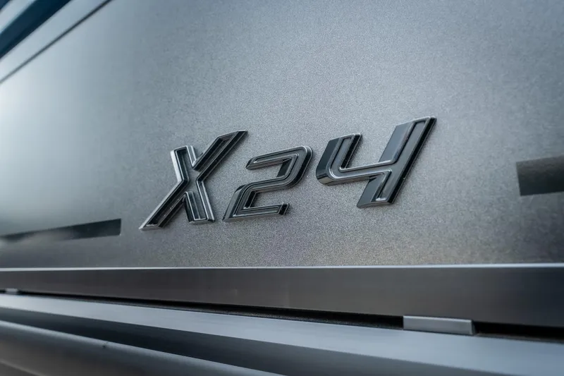 Slide: The Image of Close-up of Viaggio Lago X-U 24 emblem on metallic surface, 2026 model. - 5