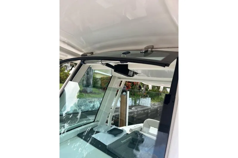 Slide: The Image of 2016 Boston Whaler 270 Dauntless boat windshield and console detail. - 7