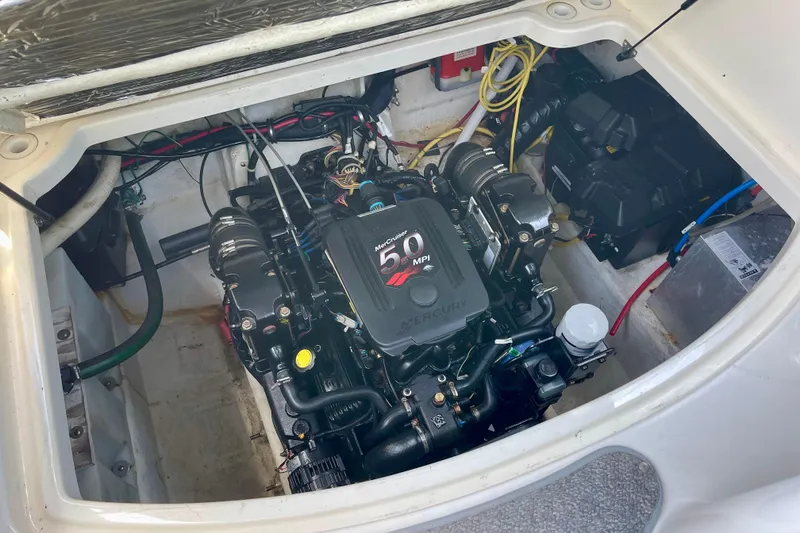 Slide: The Image of Engine compartment of a 2008 Bayliner 265 boat with MerCruiser 5.0 MPI engine. - 28