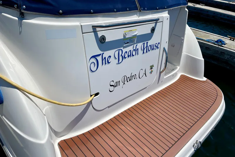 Slide: The Image of 2008 Bayliner 265 boat named "The Beach House" docked in San Pedro, CA. - 4