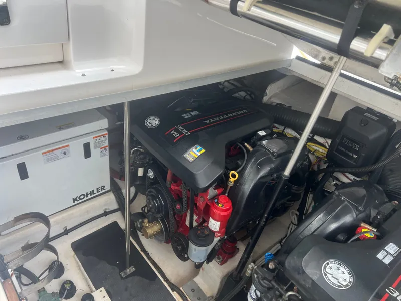 Slide: The Image of Engine compartment of a 2013 Chaparral 330 Signature boat with Volvo Penta engine. - 17