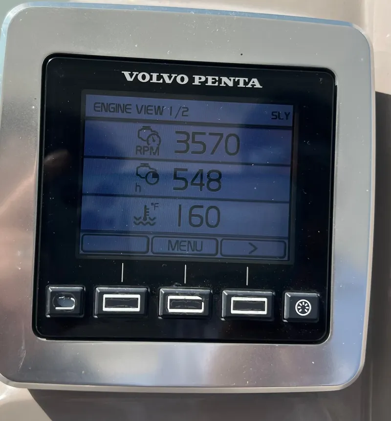 Slide: The Image of Volvo Penta engine display showing RPM, hours, and temperature. - 24