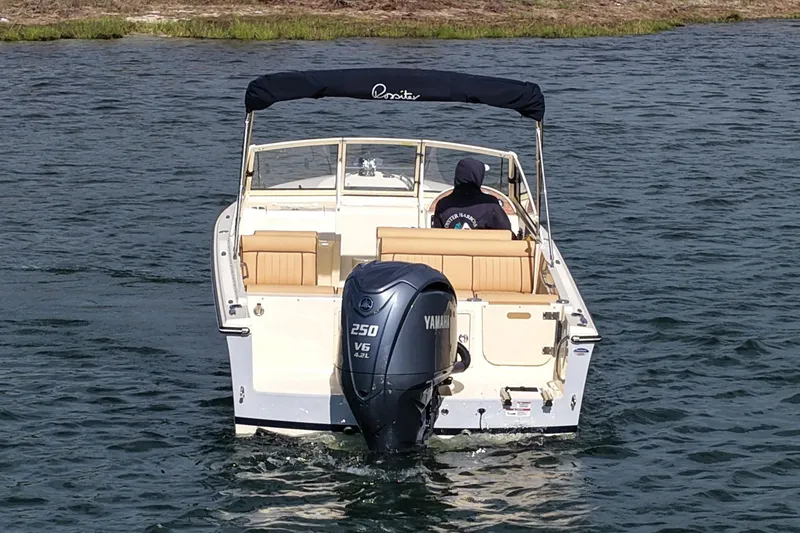 Slide: The Image of 2027 Rossiter 23 Closed Deck boat with Yamaha 250 V6 engine on water. - 6