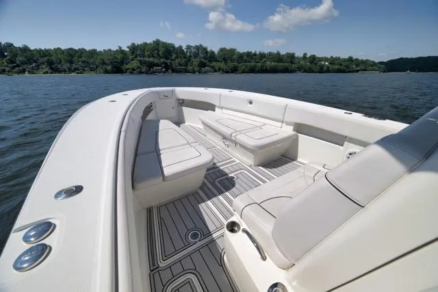 Slide: The Image of 2016 SeaVee 390 boat interior with spacious seating on calm water. - 32