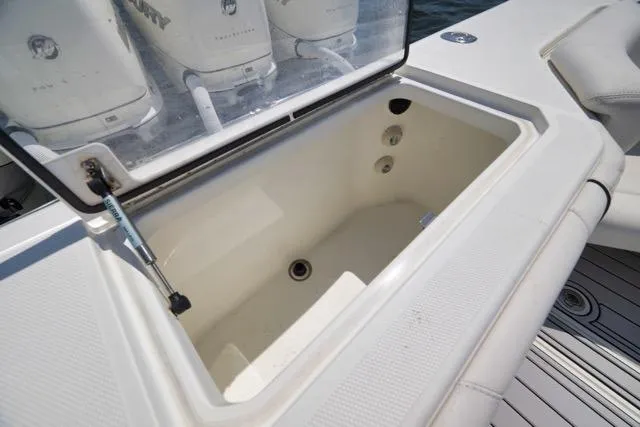 Slide: The Image of Livewell compartment on a 2016 SeaVee 390 boat, showcasing storage and functionality. - 50