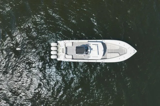 Slide: The Image of Overhead view of 2016 SeaVee 390 boat on open water. - 15