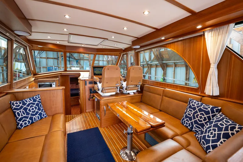 Slide: The Image of Luxurious interior of 2023 Sabre 45 Salon Express yacht with elegant wood finish. - 13