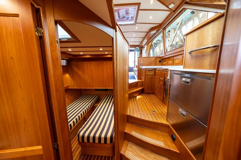 Slide: The Image of Luxurious interior of 2023 Sabre 45 Salon Express yacht with wood finish and modern amenities. - 27