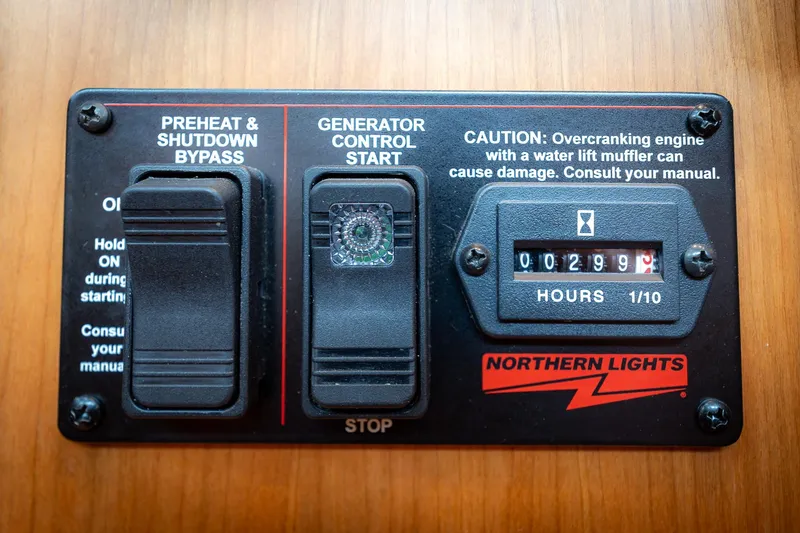 Slide: The Image of Control panel of a 2023 Sabre 45 Salon Express with generator hour meter. - 43