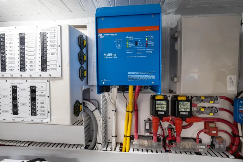 Slide: The Image of Electrical panel and inverter system on 2023 Sabre 45 Salon Express yacht. - 56