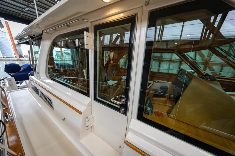 Slide: The Image of 2023 Sabre 45 Salon Express yacht, showcasing sleek exterior design and luxurious interior. - 62