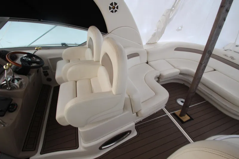 Slide: The Image of Luxurious interior of 2005 Sea Ray 340 Sundancer with plush seating and elegant design. - 26