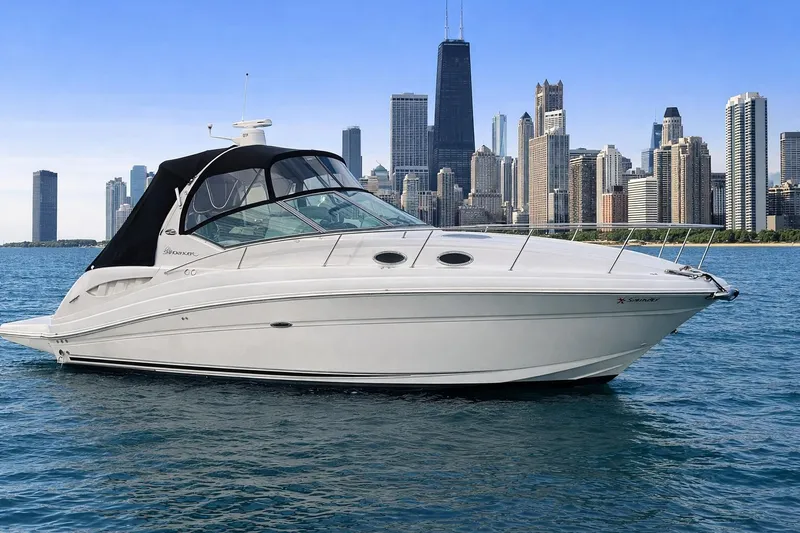 Slide: The Image of 2005 Sea Ray 340 Sundancer yacht on water with city skyline backdrop. - 37