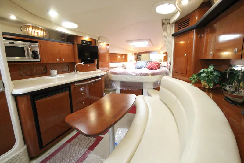 Slide: The Image of Luxurious interior of 2005 Sea Ray 340 Sundancer yacht with modern amenities. - 6