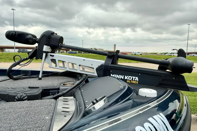 Slide: The Image of 2023 Triton 18 TrX boat with Minn Kota Ultrex trolling motor on deck. - 4