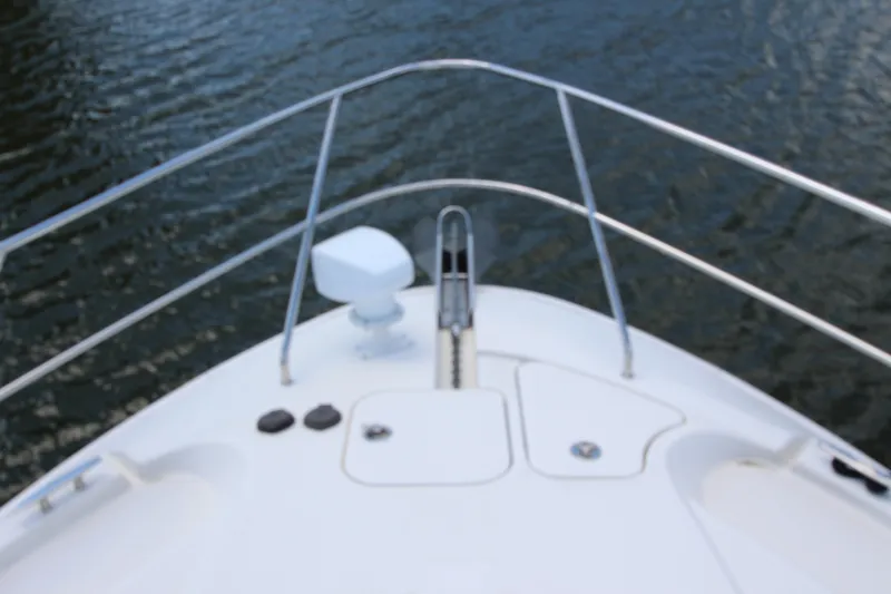 Slide: The Image of Bow view of 2006 Silverton 38 Sport Bridge on water. - 45