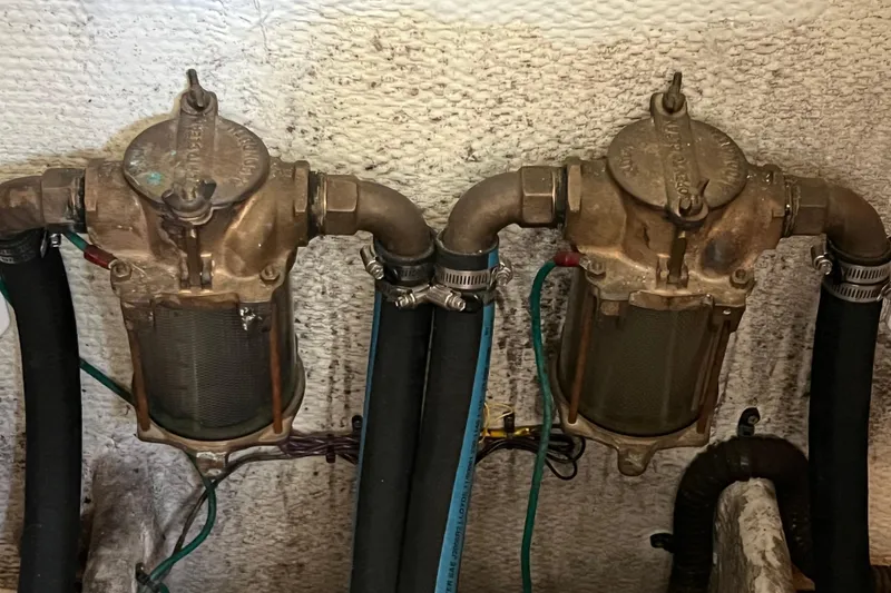 Slide: The Image of Engine room components of a 2006 Silverton 38 Sport Bridge boat. - 55