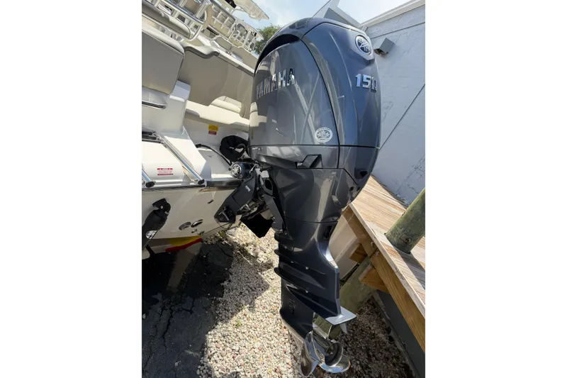 Slide: The Image of 2026 Key West 203 FS boat with Yamaha 150 HP outboard motor. - 6
