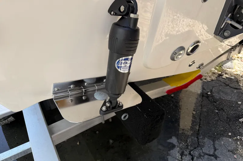 Slide: The Image of 2026 Key West 203 FS boat trim tab and actuator detail. - 9