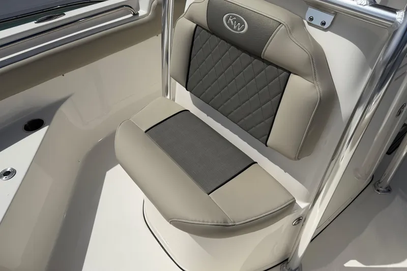Slide: The Image of 2026 Key West 203 FS boat seat with elegant gray and beige upholstery. - 14
