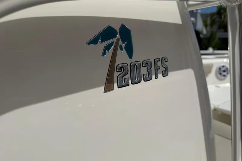 Slide: The Image of Key West 203 FS 2026 model logo on boat exterior. - 37