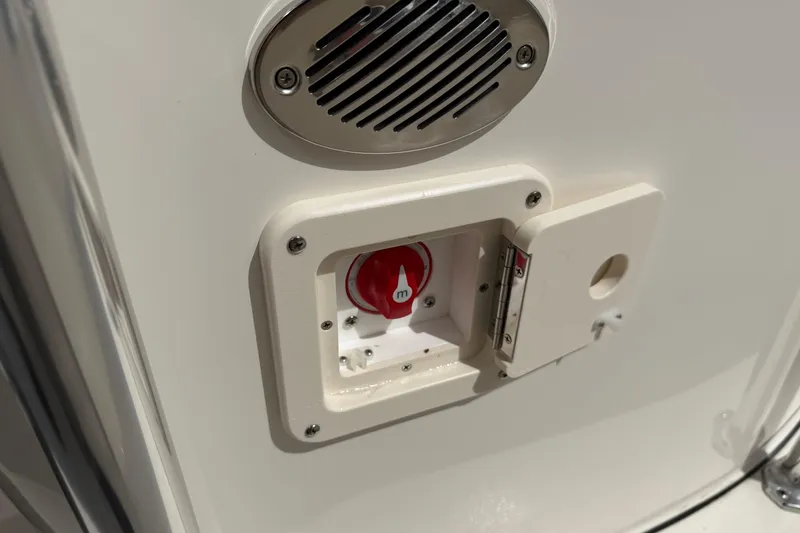 Slide: The Image of Battery switch and speaker on 2026 Key West 203 FS boat. - 36