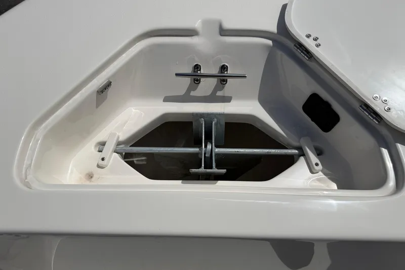 Slide: The Image of Anchor compartment of 2026 Key West 203 FS boat, showcasing storage design. - 34