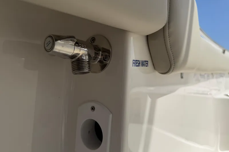 Slide: The Image of Fresh water outlet on 2026 Key West 203 FS boat, featuring chrome finish. - 33