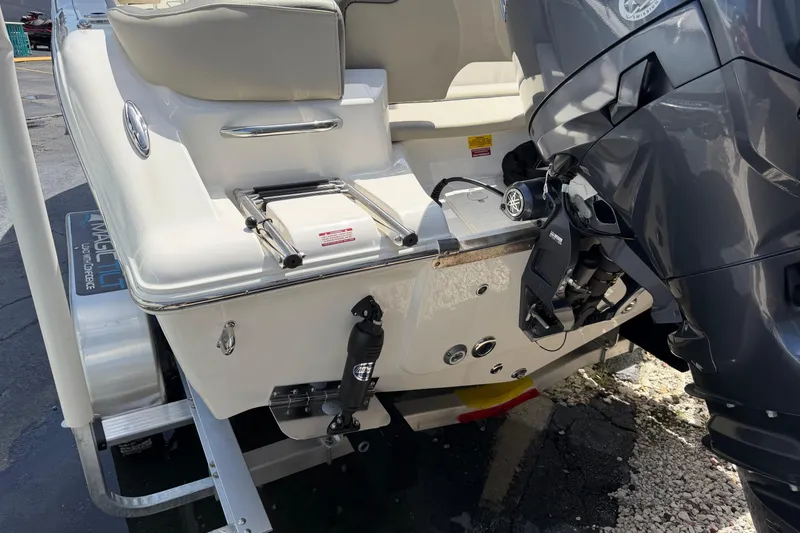 Slide: The Image of 2026 Key West 203 FS boat with Yamaha outboard motor, rear view on trailer. - 7