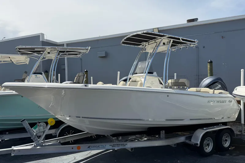 The Image of 2026 Key West 203 FS boat on trailer, featuring sleek design and modern amenities. - 1