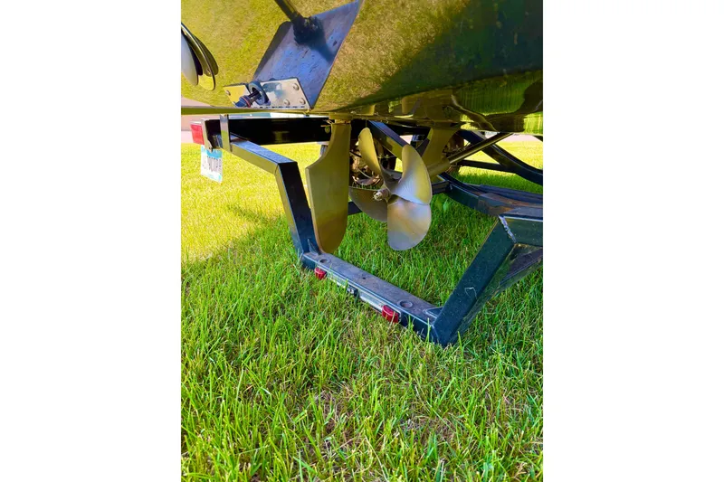 Slide: The Image of Underneath view of a 2018 Heyday WT-2 boat on a trailer, showing the propeller. - 24