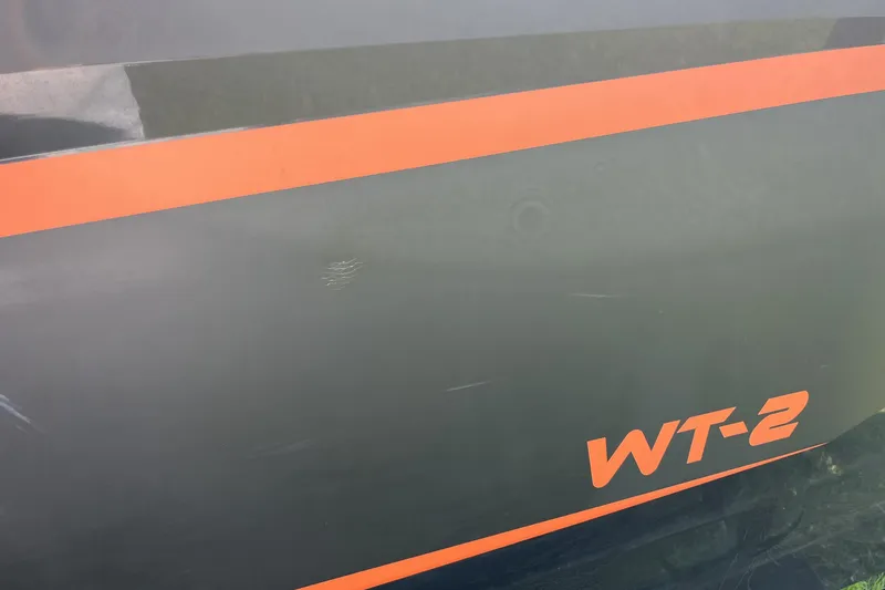 Slide: The Image of 2018 Heyday WT-2 boat with orange stripe and model lettering. - 25