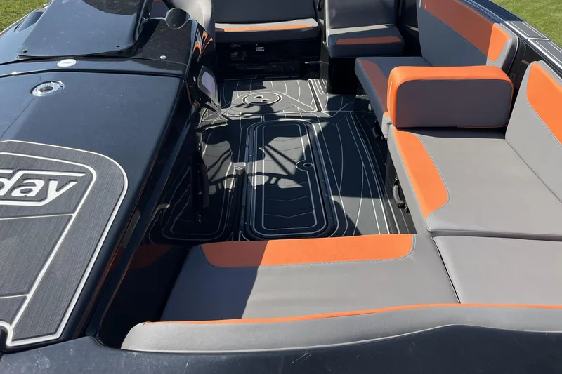 Slide: The Image of 2018 Heyday WT-2 boat interior with orange and gray seating, modern design. - 10