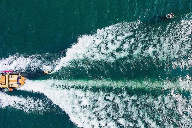 Slide: The Image of Aerial view of 2018 Heyday WT-2 boat creating waves on blue water. - 27