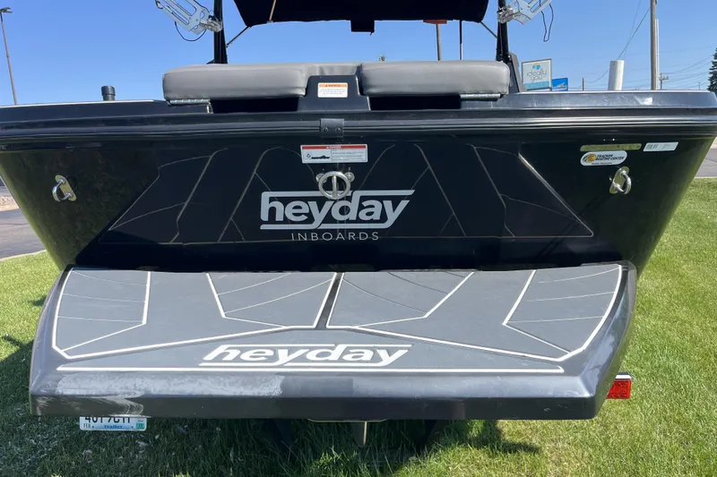 Slide: The Image of 2018 Heyday WT-2 boat rear view with logo on black hull. - 6