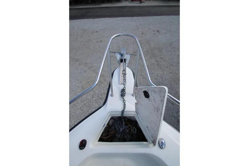 Slide: The Image of Bow view of 2002 Hydra-Sports 230 WA with anchor chain and storage compartment. - 16