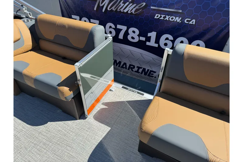 Slide: The Image of 2026 Tahoe Pontoon Geofish RF 21 interior seating with banner in background. - 35