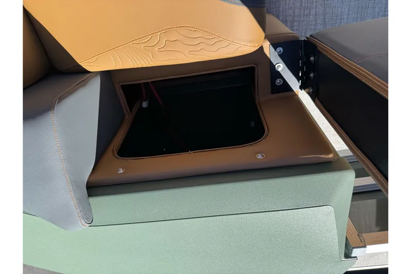 Slide: The Image of Storage compartment in 2026 Tahoe Pontoon Geofish RF 21 boat seat. - 33